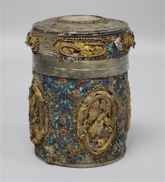 A Chinese white metal filigreework and enamel jar and cover, 10.1cm.